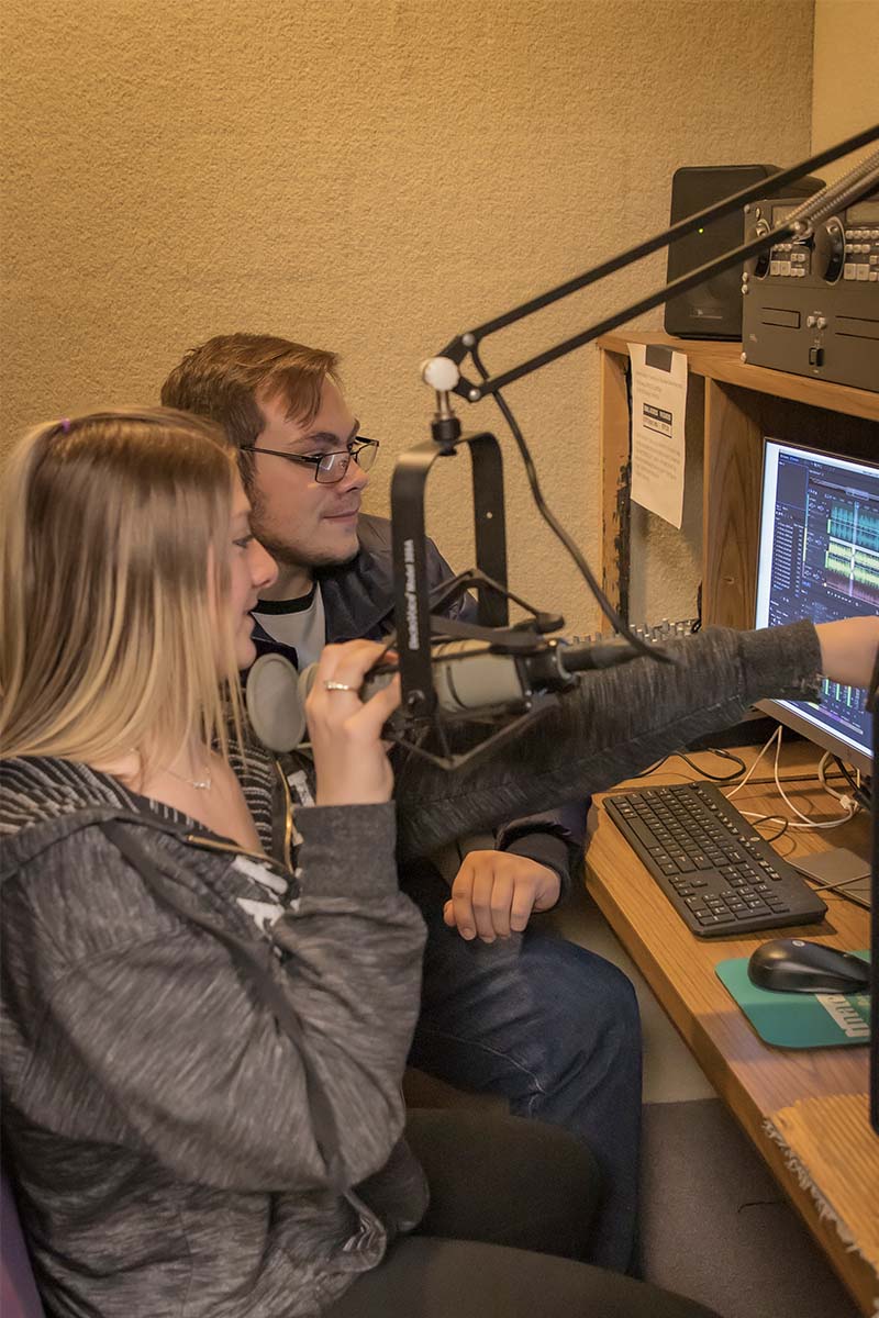 studnets in broadcast booth