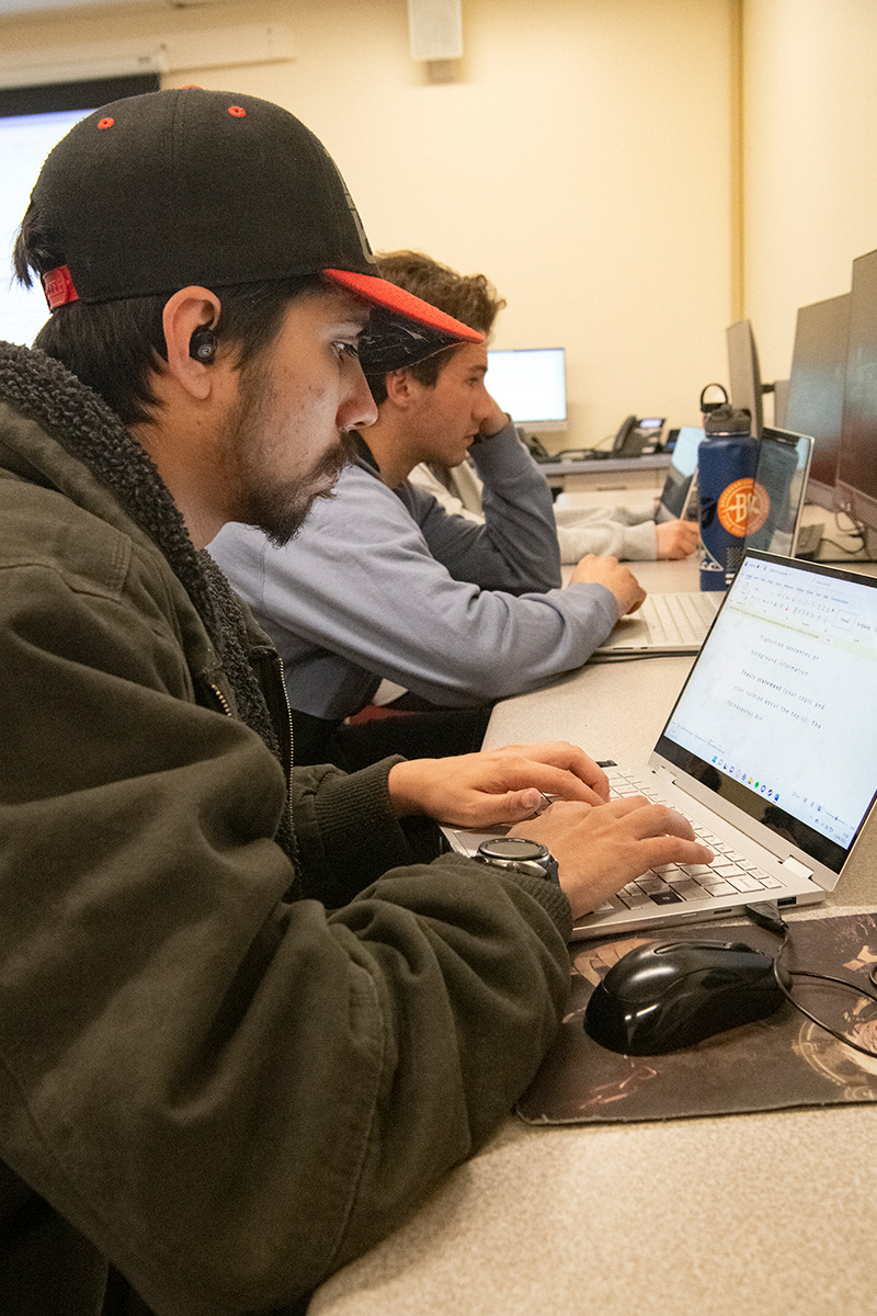 student working on laptop