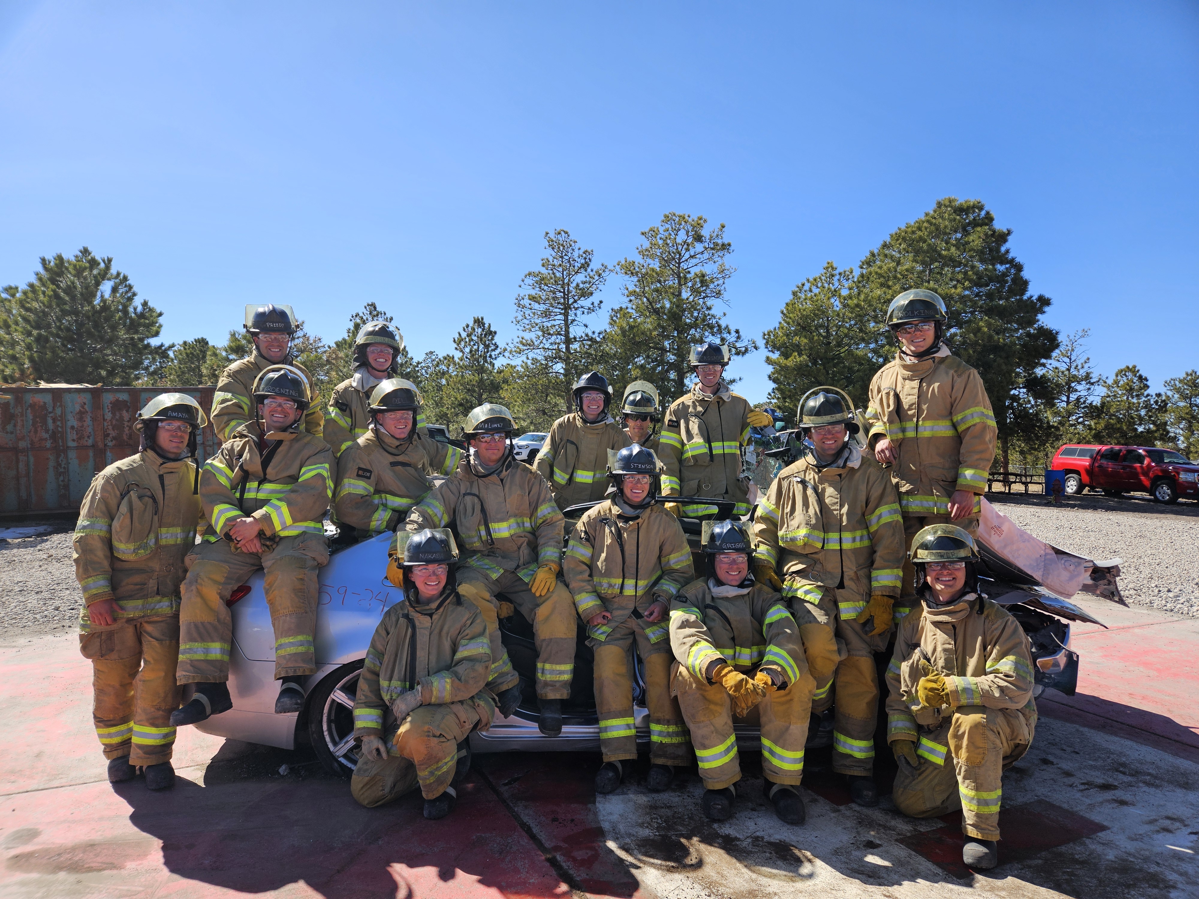student in firefighting gear