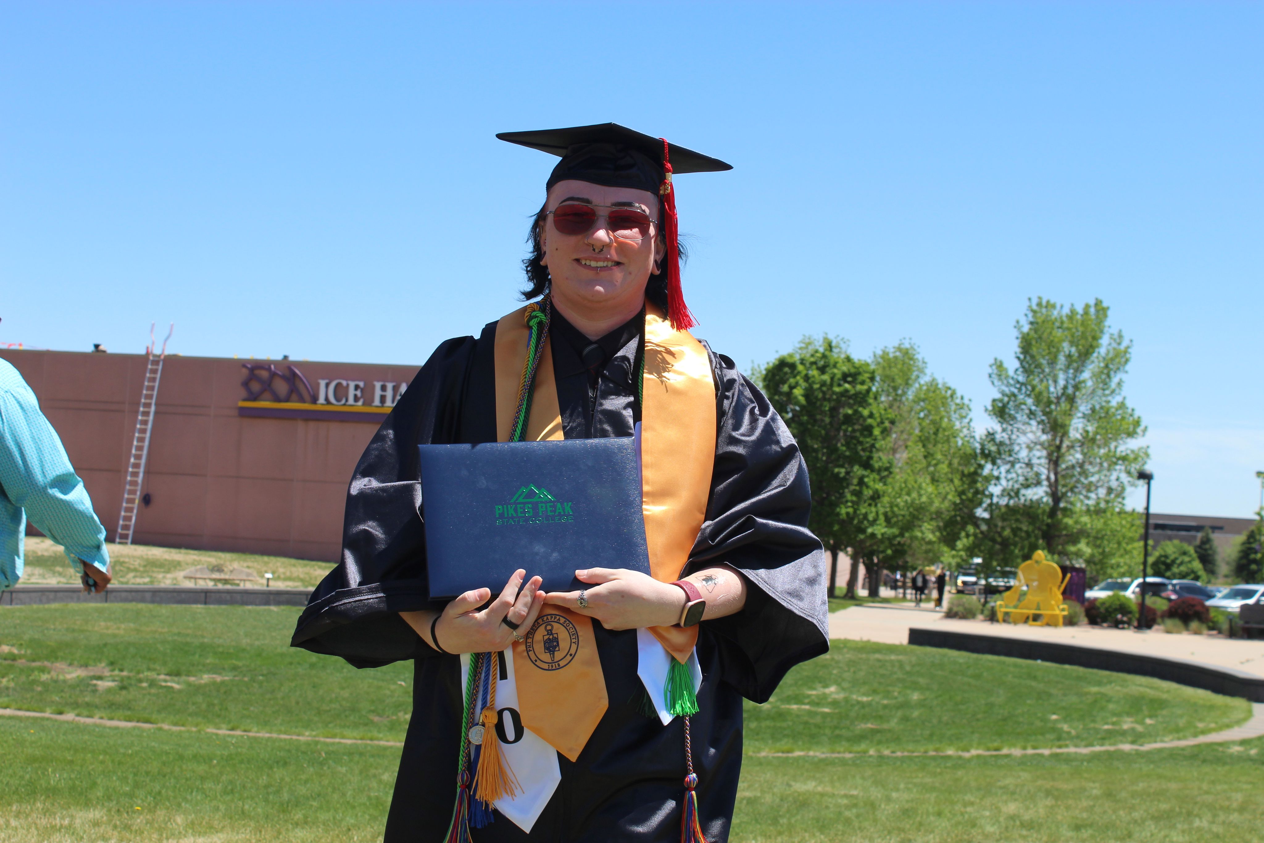 TRIO Student in Graduation Regalia