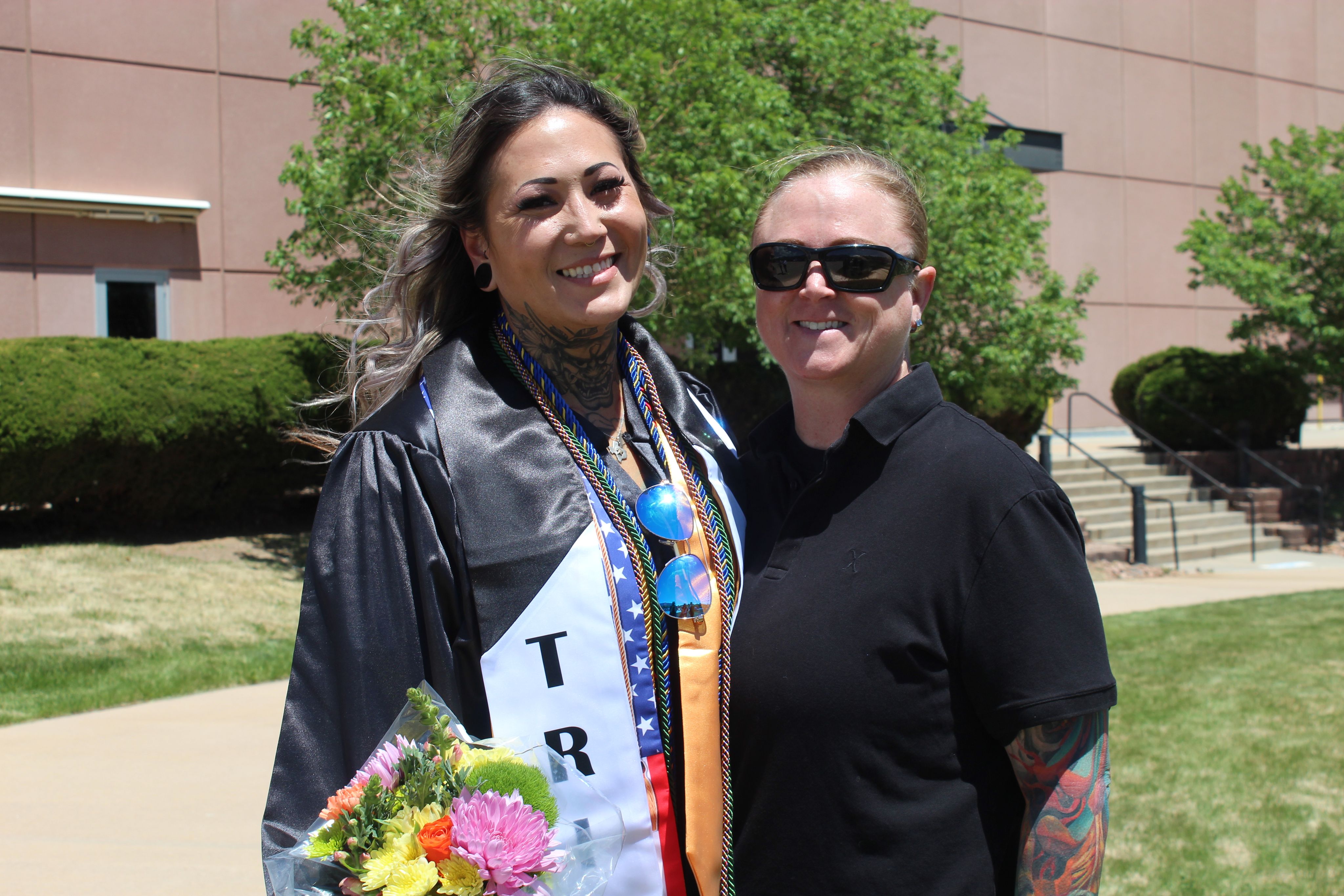 TRIO Graduate in regalia