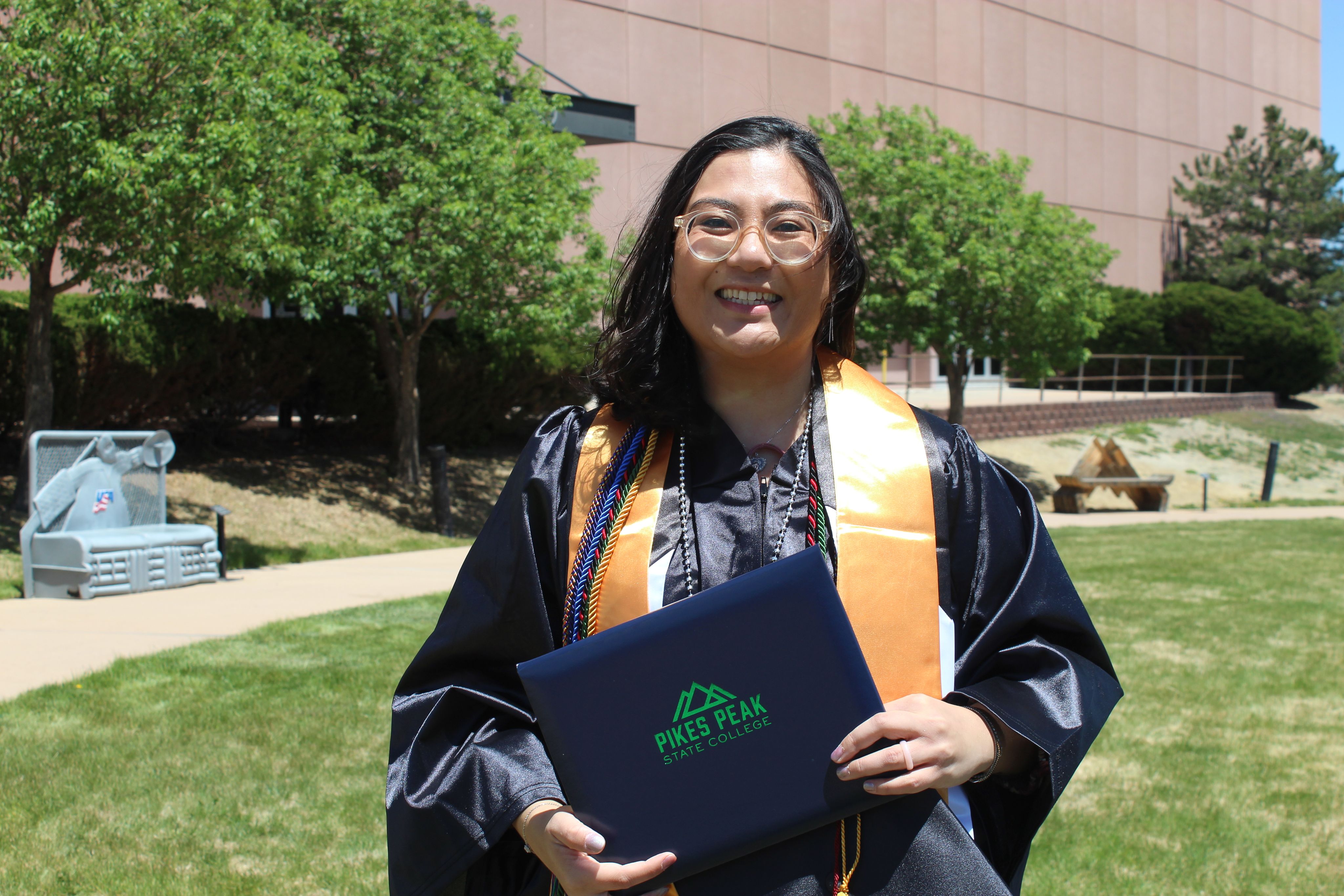 TRIO Graduate in regalia
